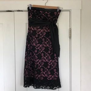 Fitted pink and black lacy strapless dress